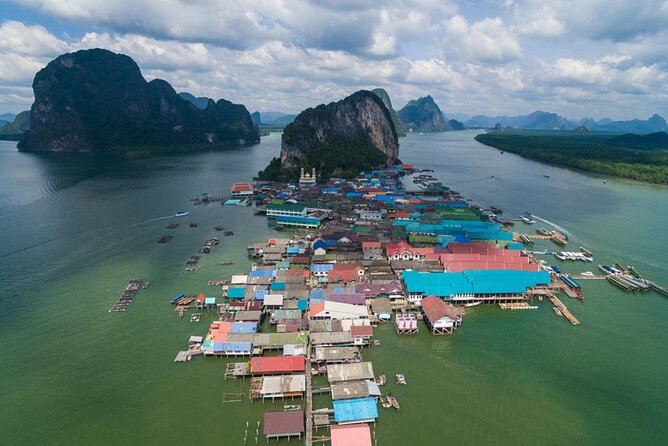 James Bond Island & Canoe Tour by Longtail Boat - Full Day from Khao Lak - Monkey Cave at Wat Suwan Khuha: statues, carvings, and primates