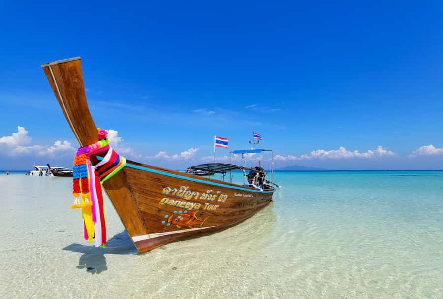 Khao Lak: Day Trip to Phi Phi with Private Longtail Tour - First stop on Phi Phi Don: 50–60 minutes to get oriented