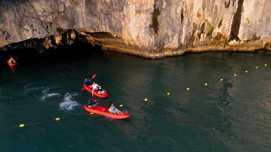 Khao Lak: Twilight Sea Canoe and Glowing Plankton Tour - First kayaking session in Phang Nga Bay: caves, lagoons, and wildlife time
