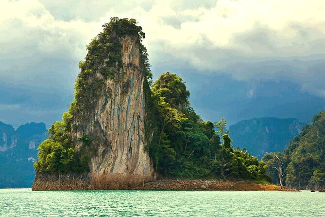 Khao Sok: Full Day Bamboo Rafting Tour from Khao Lak - Elephant rescue camp: feeding, bathing, and what to watch for