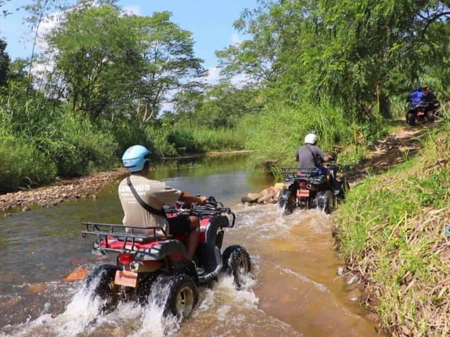 KhaoLak:ATV, ZipLine, & Rafting Adventure Monkey Cave Temple - 200-meter zipline through the treetops: views, speed, and first-timer nerves